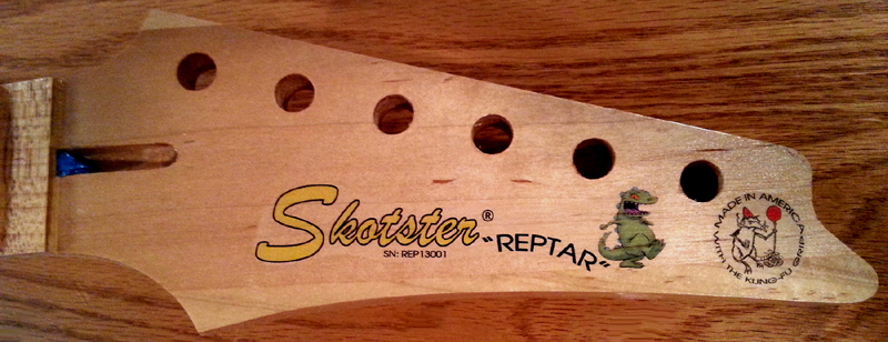 REPTAR_HeadStock_1800_00